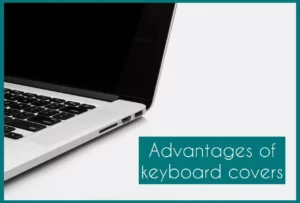 A white macbook on a white surface with text that says "Advantages of keyboard covers"