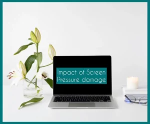"Impact of Screen Pressure Damage" written on a grey Macbook
